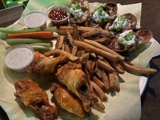 Sampler Platter ($17): chicken wings, fries instead of onion rings, and potato skins. Side of bleu cheese dressing ($0.50).