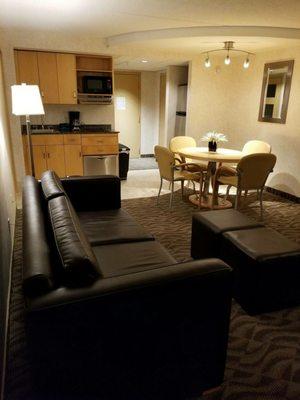 1bedrm suite w/living, dining, 1/2 Kitchenette w/full Frig, 1/2 dishwasher and 1/2 bathroom separate from master bedroom, Nice!