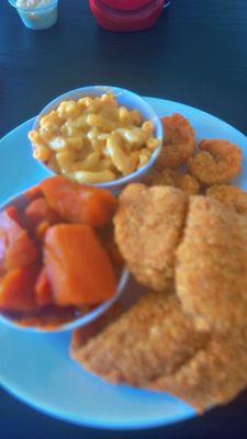 Two piece fried fish with two sides, macaroni and cheese and yams and added four  shrimp