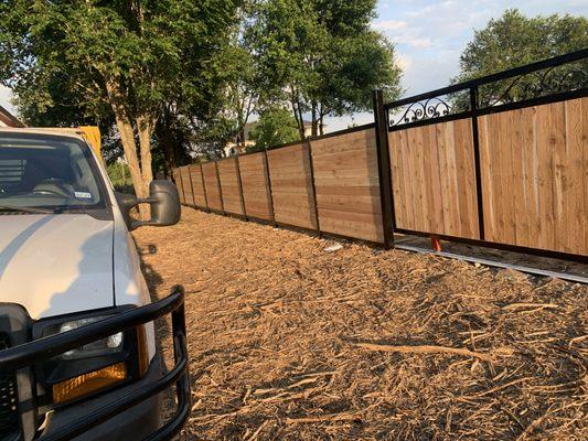 Metal frame with wood pickets
- Prairie View, TX