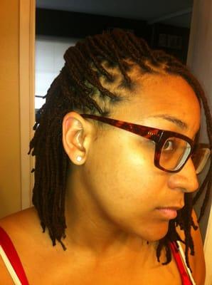 Yarn braids, pinned on one side