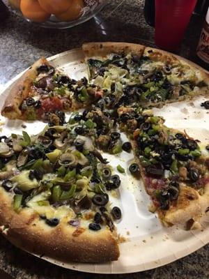 Two pizzas in this pic... The mammoth and one of their veggies specials. So good!!