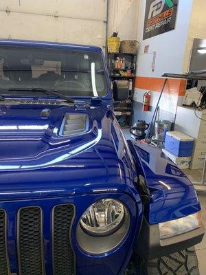 Repaired hail damaged hood