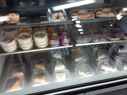 Dessert case with rice pudding (made in-house), pies, baklava, canolis and Sabra prezel dips.