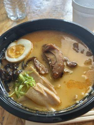 Spicy chicken.....delicious!! The bowl was plastic too, so you just threw everything away when you were done