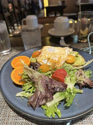 Avocado toast, side of greens. Bit bland, but not bad.