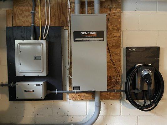 Car charger on the right and extra panel on the left.