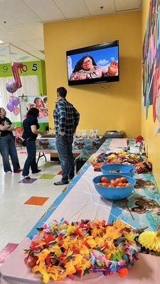 Inside of the party room where the TV is