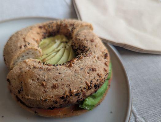 Everything bagel toasted with butter plus avocado, and tomato  YUM!