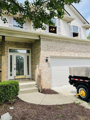 Garage doors, front door and shutters recently painted.