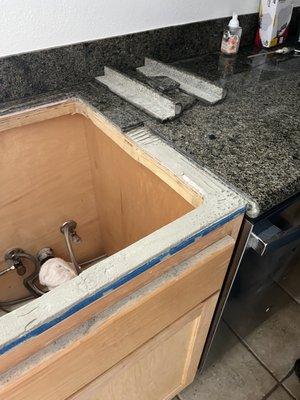 This is my granite countertop that was destroyed while putting in new sink