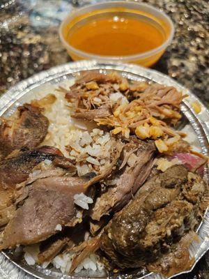 Pulled pork, white rice, beans, and all the salt you can find in newark.