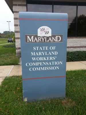 The placard in front of the commission hearing rooms