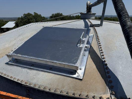 Aluminum roof hatch fabricated and installed on ground storage tank