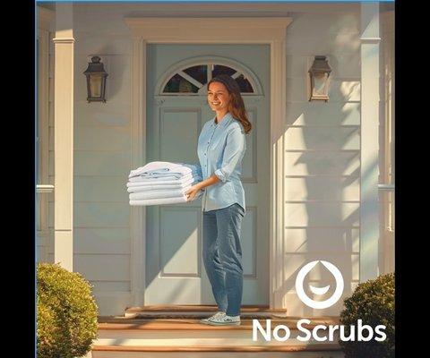 Happy customer using No Scrubs Laundry