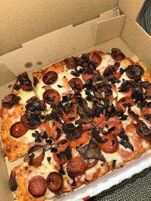 HALF Pepperoni with mushrooms. (We've cut the pizza slices in half.)