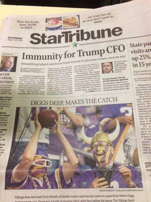 Reading the Saturday morning newspaper with a good cup of coffee here at Pete's Grill in Hector Minnesota