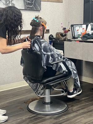Getting ready for the cut while I was so nervous watching it fall to the floor.