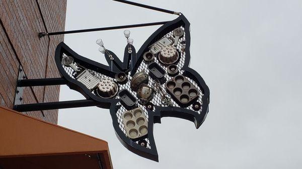 Cool exterior art above their awning (November 2021).