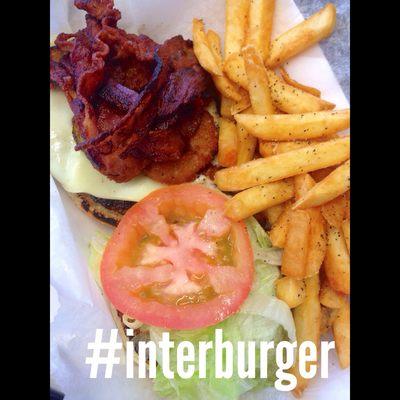 Interburger lettuce tomato bacon fried pickles and American cheese