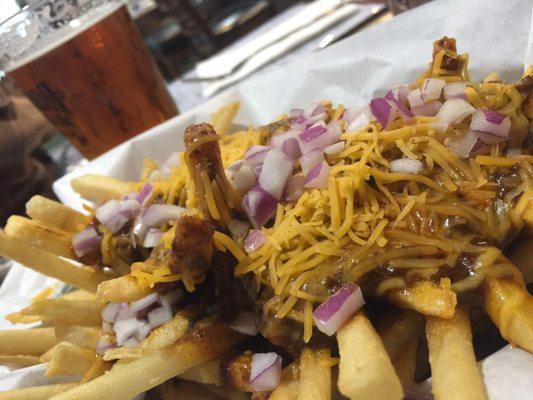 Nom! Chili cheese fries washed down with ice cold beer!!