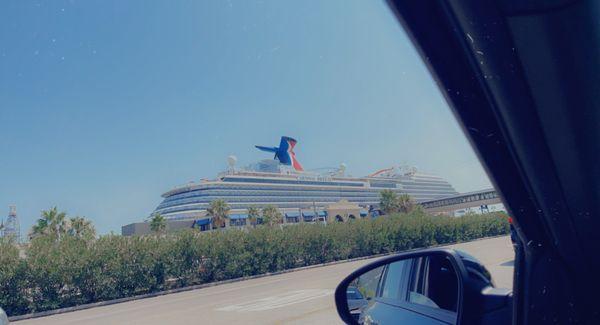 It's about a five minute shuttle ride to the cruise ship however you could walk probably in 10 to 15 minutes.