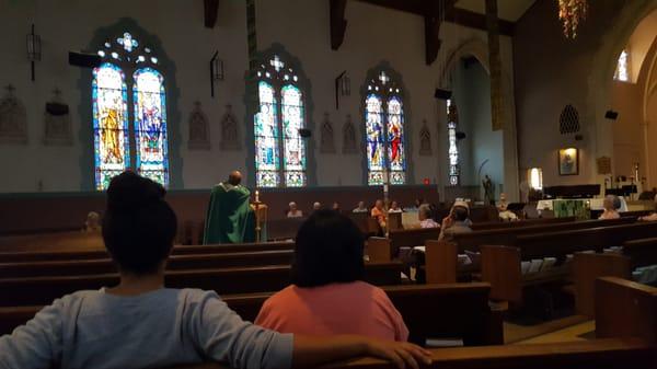 The sound system for the priest's sermon wasn't working very well. I wish I could have heard more of it.