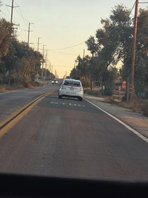 Number 303 swerving through back roads and running res lights