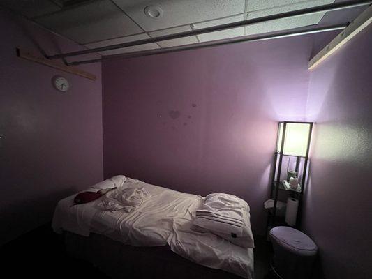 Bars on ceiling, clean traditional eastern massage environment.