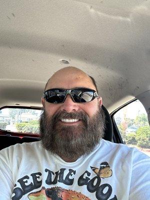 This is me sitting in my car right outside the barbershop as I was preparing to leave. Looks pretty good if I have to say so myself.