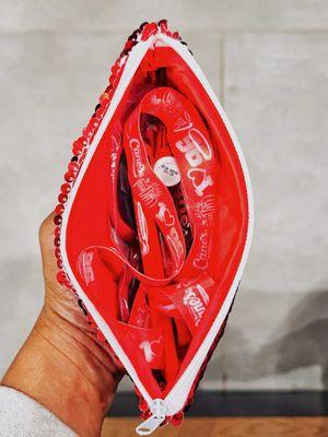 Cane's Swag -- Sequin Clutch, Ink Pen, Keychain, Lanyard, Lip Balm, Sunglasses