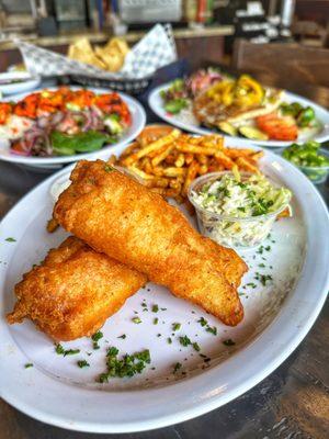 Fish & Chips (Cod): Seasoned fries, coleslaw and Mojo sauce