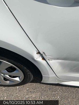 The car they gave me with a big dent in it.