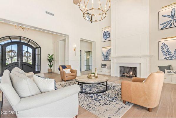 Great room. Designed each element from house plans, front door design, lighting, art, flooring, paint selections, and furniture