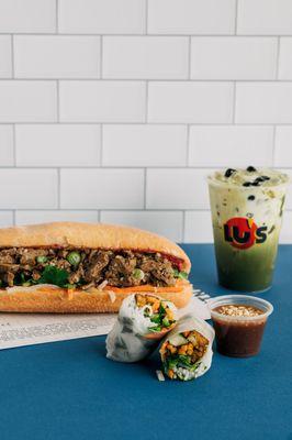 Banh MI Sandwich, Pork and Shrimp springrolls, and a cup of delicious Green Tea Latte