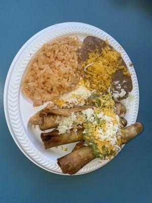 Burnt taquitos with cold rice and beans.