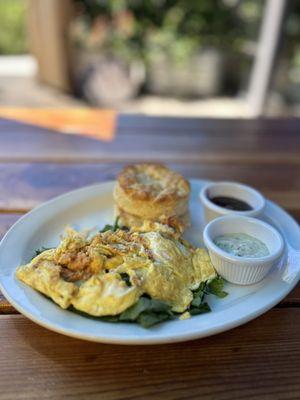 Smoked Salmon and eggs on a bed of fresh spinach; served with the most delicious homemade biscuits and jam. I had the sauce on the side.
