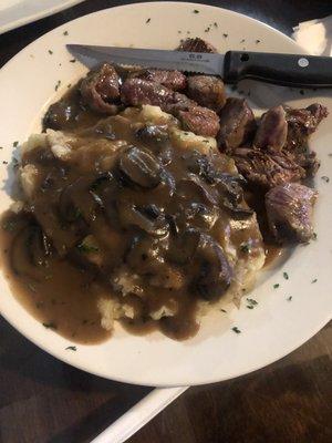 Steak tip poutine modified into steak tips with real mashed potatoes and gravy