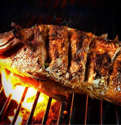 Grilled whole hog fish