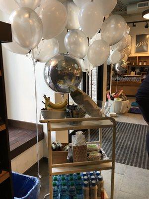 Balloons and complimentary snacks! Celebrating winning Saturday morning.