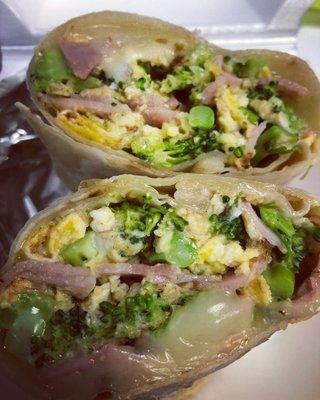 Delicious broccoli, pepper jack, ham breakfast wrap.