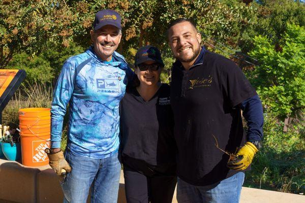 All smiles while giving back.