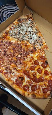 Garlic and mushrooms on one slice, bacon on another slice, and then the classic pepperoni.