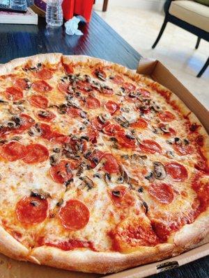 Pepperoni and mushroom pizza