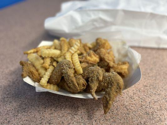 My meal- fried whole wings, fries, and shrimp- good