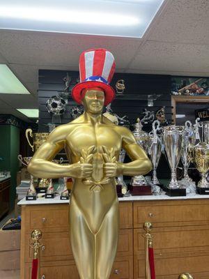Take a photo with our Gold Man He is celebrating Veterans Day. Wait for his Christmas Decorations.