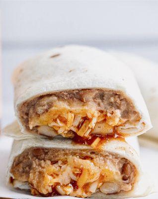 I got a bean & cheese burrito added rice and red chili sauce! Yummy!