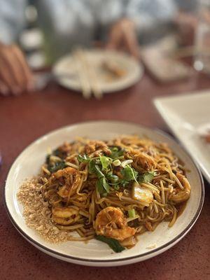 Pad Thai: stir fried rice noodle, basil, egg, bean sprout, white/green onion, garnish w/ peanut, cilantro & fresh lime w/shrimp | $19.95