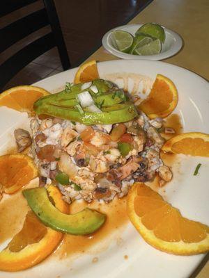 This is the Ceviche . I absolutely loved it , perfect amount of seasoning! And excellent service