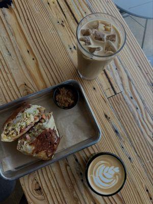 Breakfast burrito, iced latte, and Cortado
